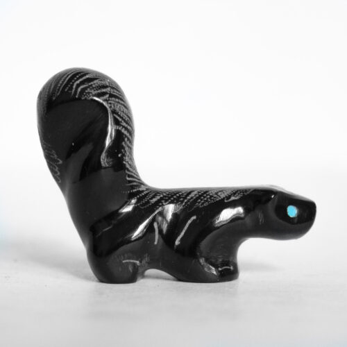 Garrick Acque Skunk Carving